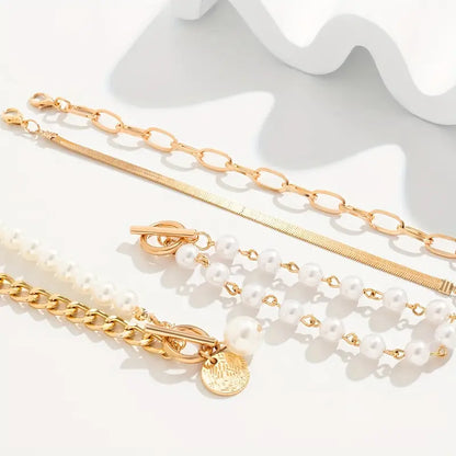 Set de 4 Pulseras | Serpiente, Perlas y Eslabones