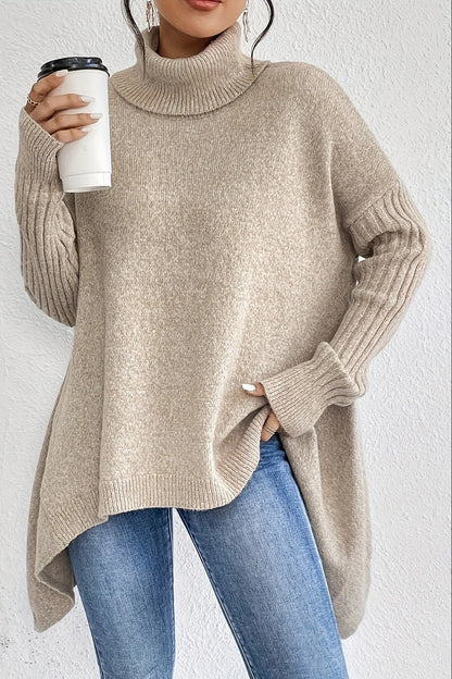 Suéter oversize de mujer con cuello alto y dobladillo asimétrico