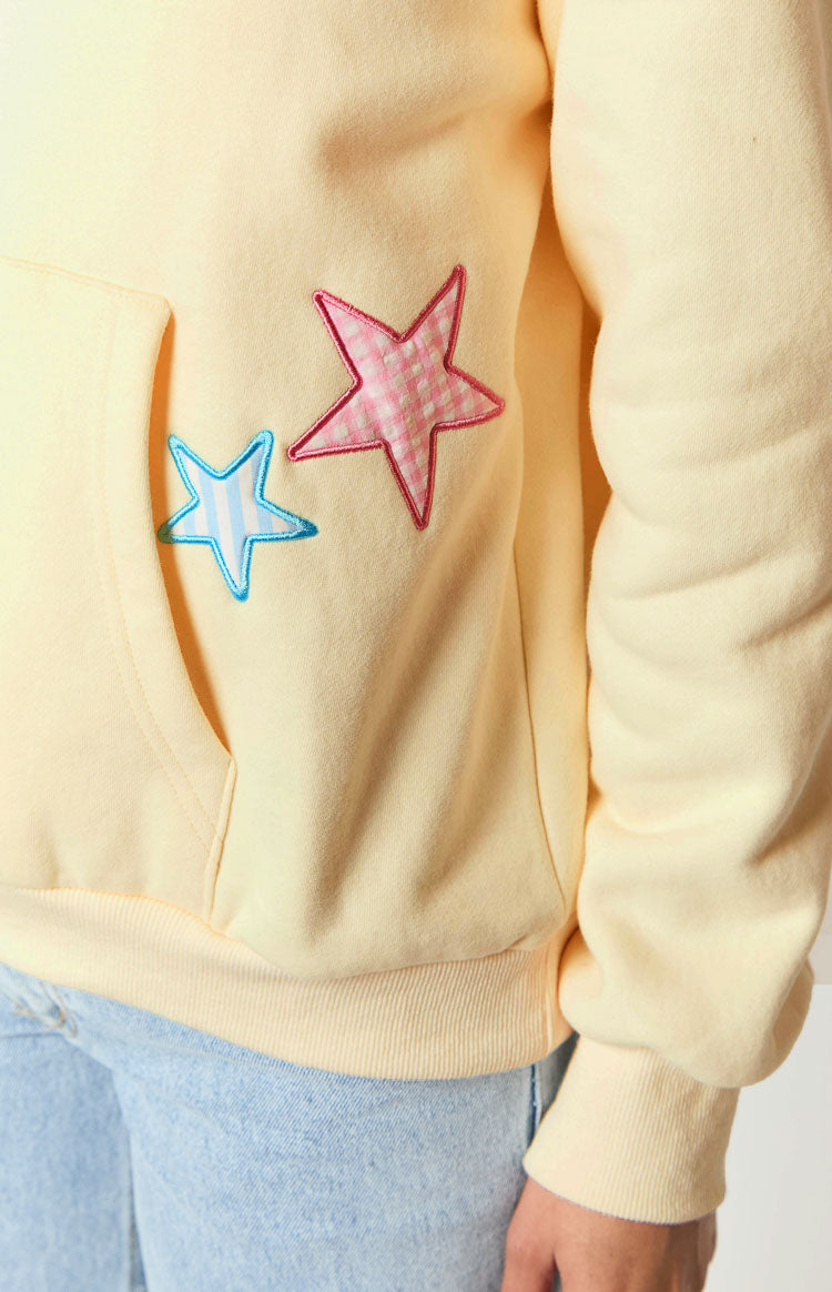 Lucero | Sudadera Oversize con Parches de Estrellas